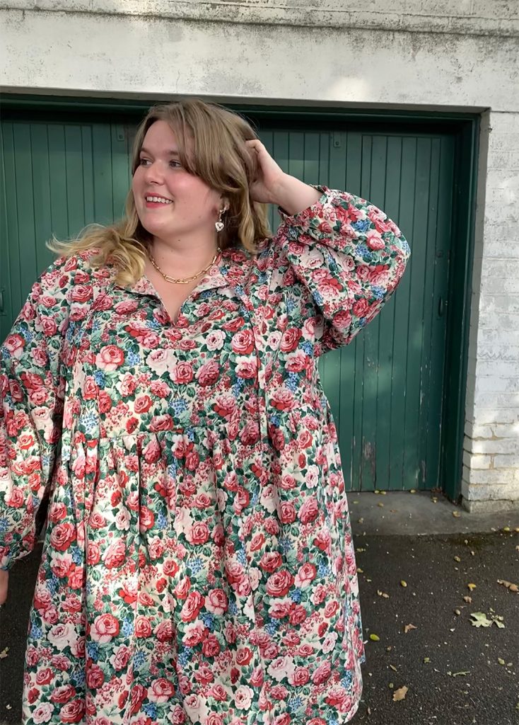 The March top and dress sewing pattern is a 70s inspired dress featuring puffy sleeves and a gathered skirt or peplum waist.