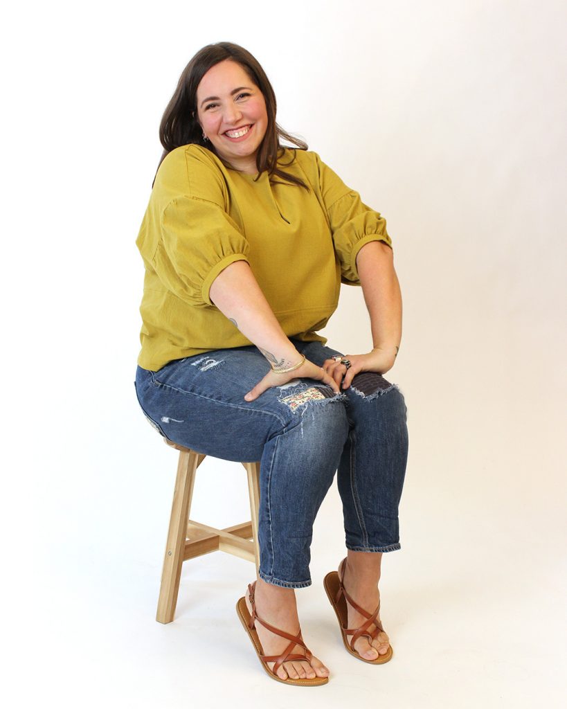 Nokomis modeling the March top, view C shown seated.